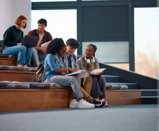 Students sitting on bleachers