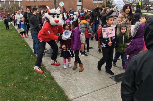 Blaze from the Portland Trail Blazers joins in on the Peace March 