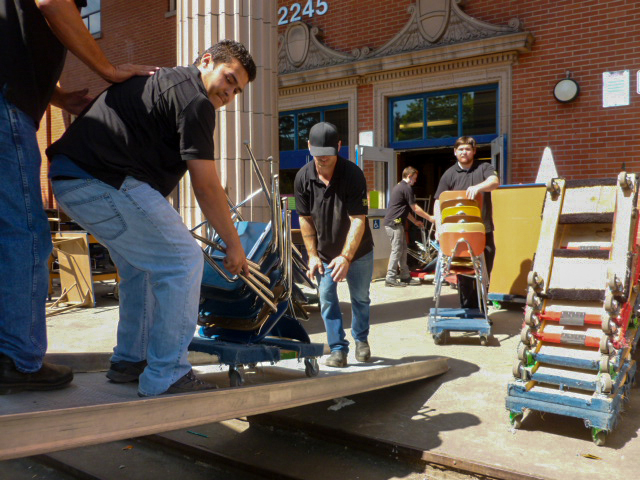  Workers move funiture from Grant High School.