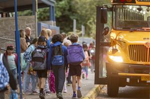 Photo of school bus with students