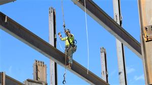Working attaching steel beams 