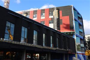 Lincoln building exterior panels in place