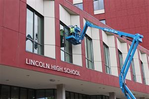 Finishing touches on front of the new Lincoln school