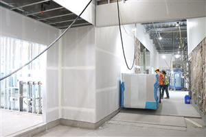 Drywalls work is complted in this hallway