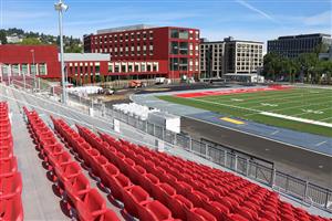 New Grandstand with School buildings in the background