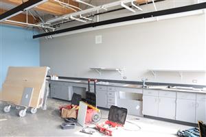 Cabinetry is installed in a classroom