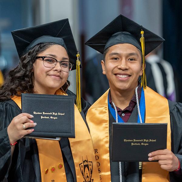 Two students at graduation