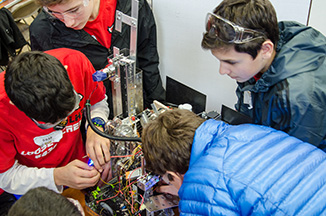 Students working on a robot